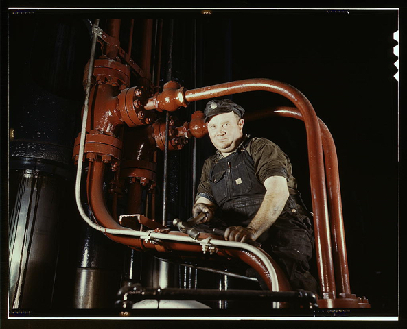 Maintenance mechanic in largest coal press in world, Combustion Engineering Co., Chattanooga, Tenn. (LOC) by The Library of Congress / No known copyright restrictions Maintenance mechanic in largest coal press in world, Combustion Engineering Co., Chattanooga, Tenn. (LOC)