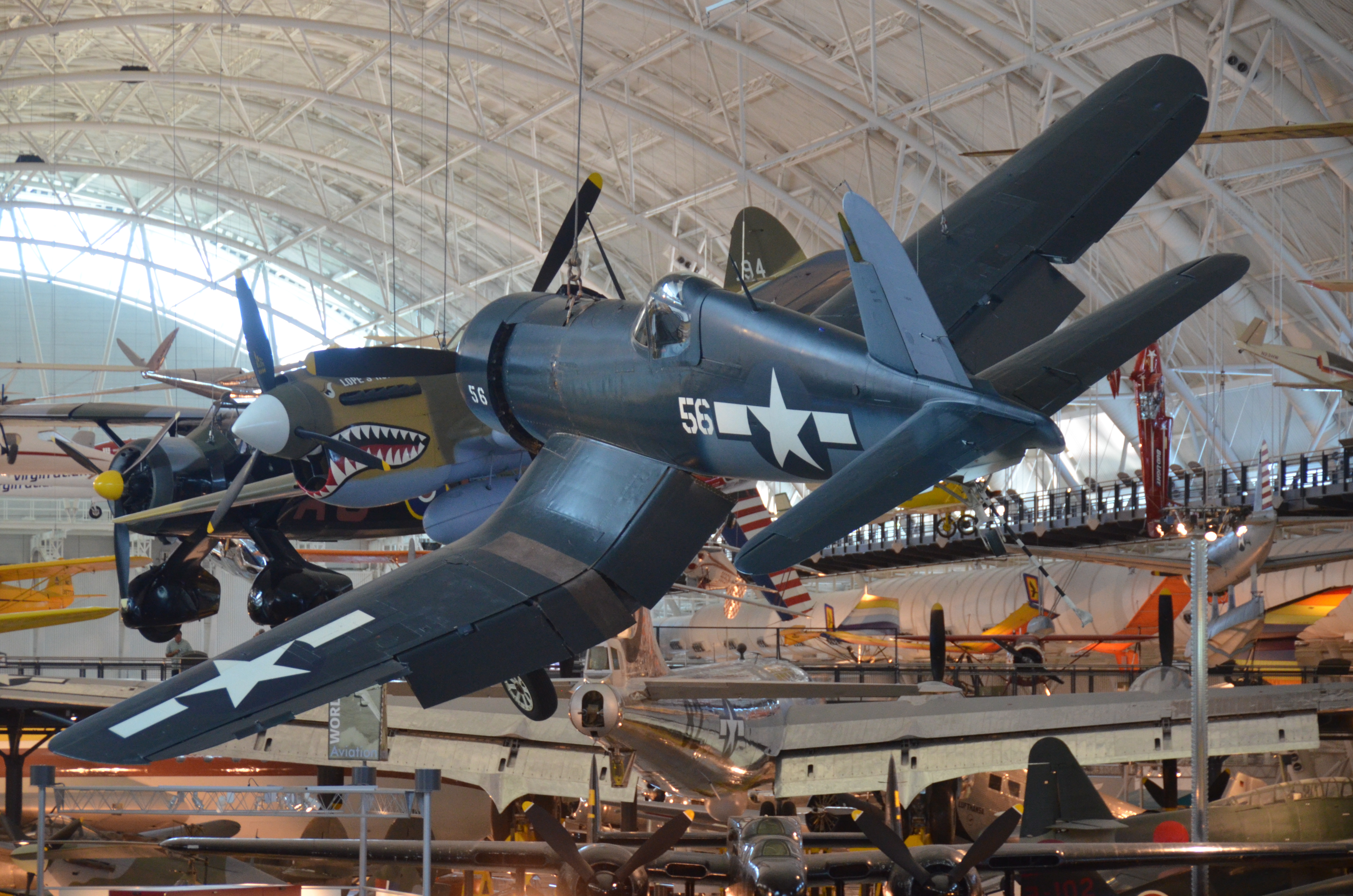 Steven F. Udvar-Hazy Center: Vought F4U-1D Corsair, with P-40 Warhawk in background by Chris Devers / CC BY-NC-ND 2.0 Steven F. Udvar-Hazy Center: Vought F4U-1D Corsair, with P-40 Warhawk in background