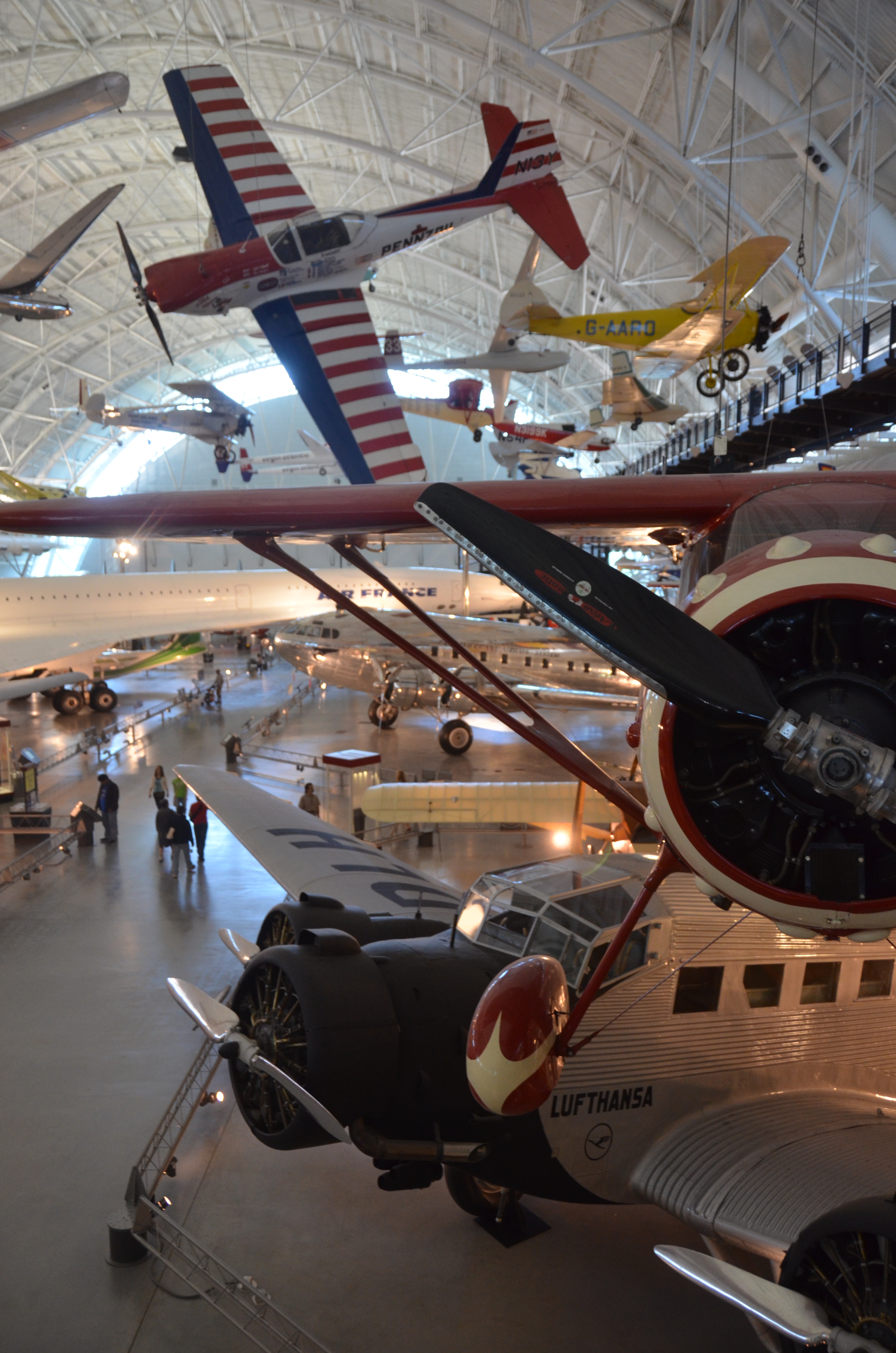 Steven F. Udvar-Hazy Center: south hangar panorama, including Air France Concorde, Boeing 307 Stratoliner "Clipper Flying Cloud", De Havilland-Canada DHC-1A Chipmunk Pennzoil Special, Monocoupe 110 Special among others