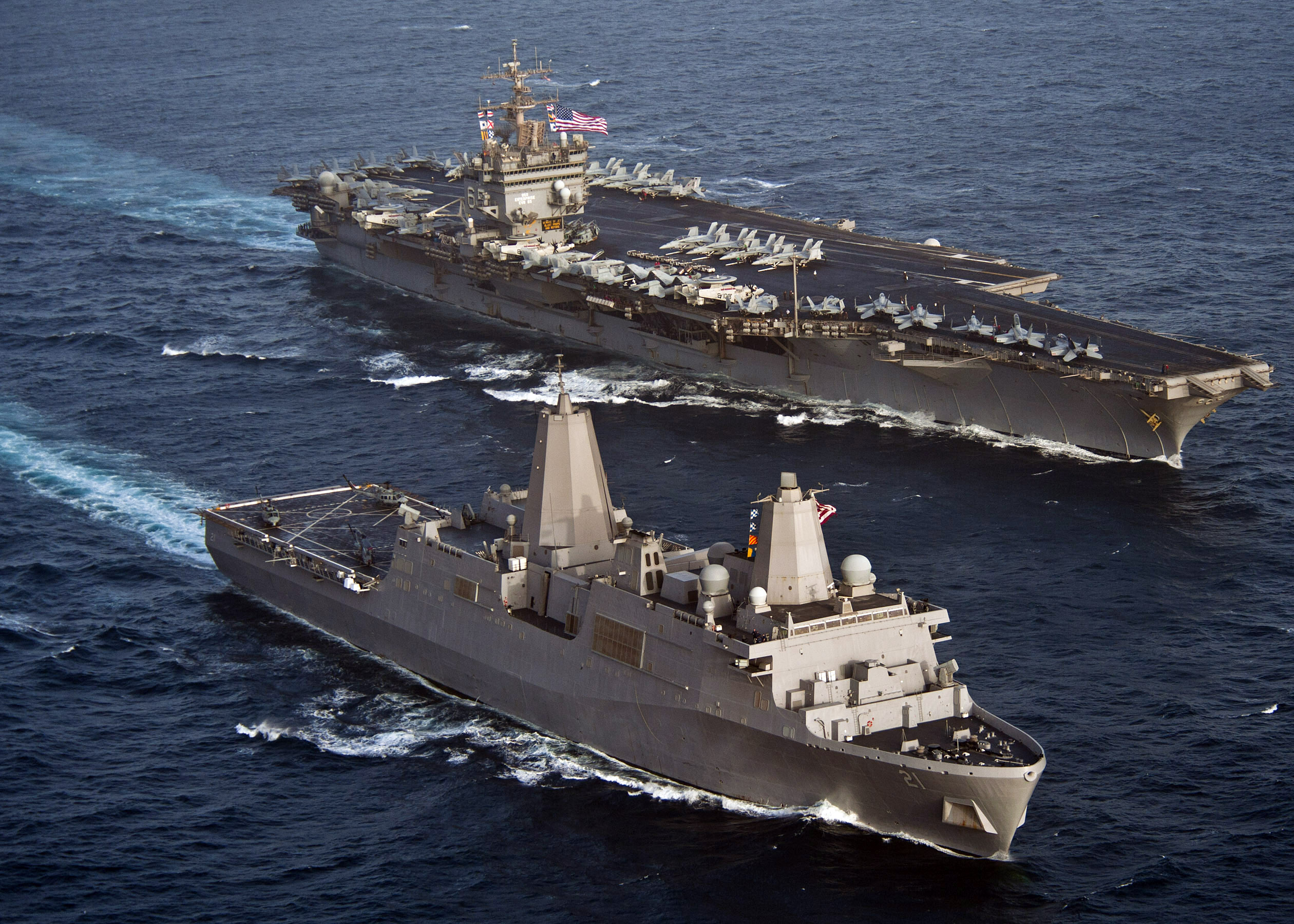 USS New York (LPD 21) and USS Enterprise (CVN 65) are underway together.