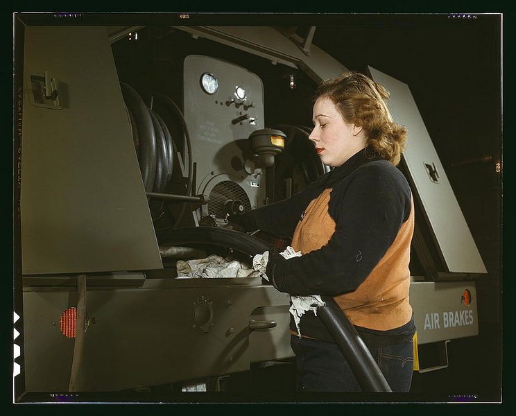 Agnes Cliemka, age 23, married and husband may be going into the service any day, Heil and Co., Milwaukee, Wisconsin. Agnes used to work in a dep[artmen]t store. Checking of gasoline hose of gasoline trailers before being turned over the Air Force  (LOC)