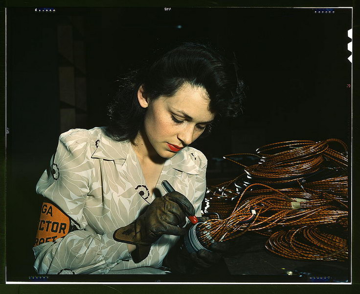 Woman aircraft worker, Vega Aircraft Corporation, Burbank, Calif. Shown checking electrical assemblies  (LOC)