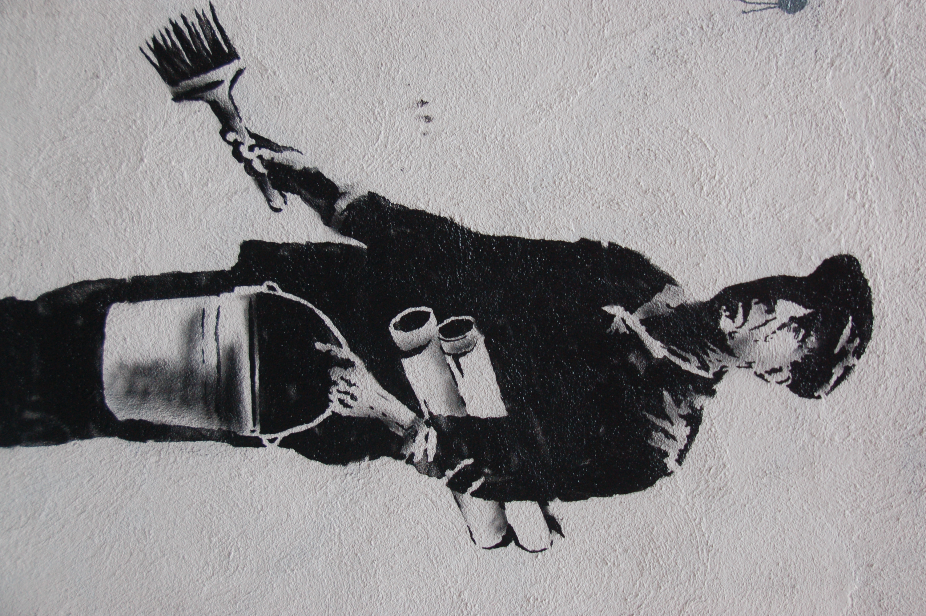 Banksy in Boston: Figure from the F̶O̶L̶L̶O̶W̶ ̶Y̶O̶U̶R̶ ̶D̶R̶E̶A̶M̶S̶ CANCELLED piece on Essex St, Chinatown, Boston