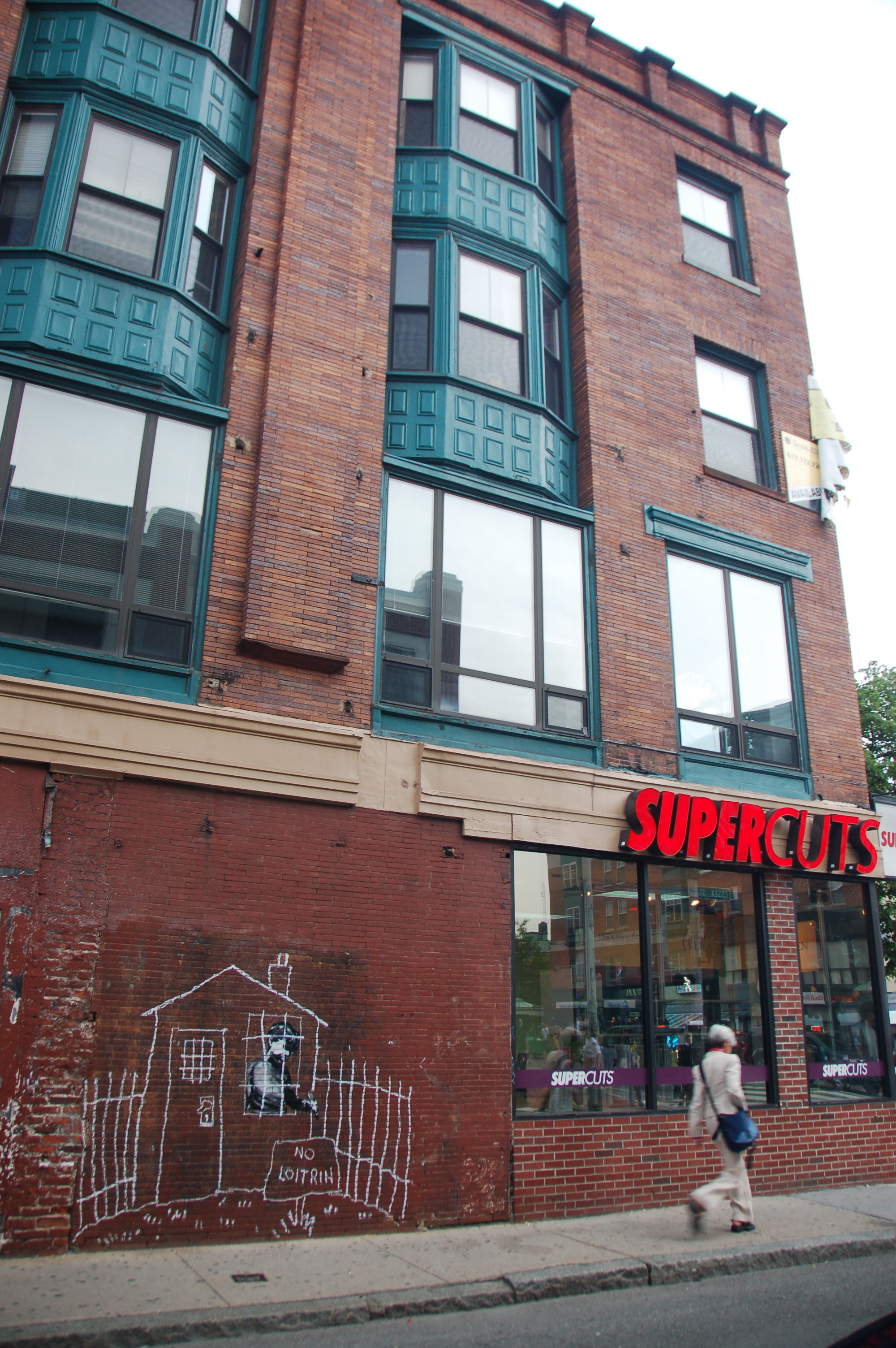 Banksy in Boston: Overview of the NO LOITRIN piece on Essex St in Central Square, Cambridge by Chris Devers / CC BY-NC-ND 2.0 Banksy in Boston: Overview of the NO LOITRIN piece on Essex St in Central Square, Cambridge